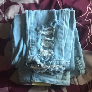 Brand new ripped distressed jeans